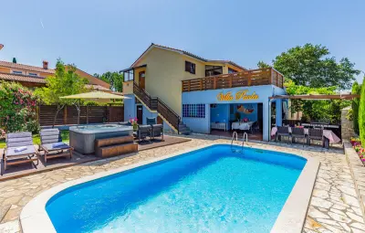 Location Maison à Marcana 12 personnes