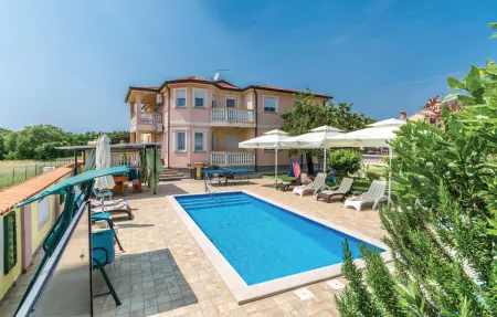 Location Maison à Marcana 12 personnes