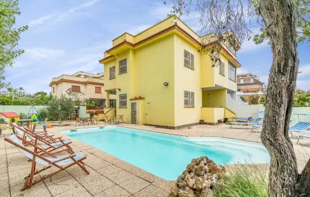 Location Maison à Torvaianica 9 personnes