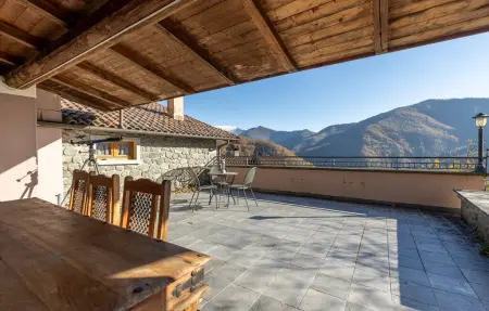 Location Maison à Comano 9 personnes